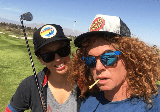 Carrot Top with his long-time girlfriend Amanda Hogan. His relationship proves that he's not gay or bisexual. 