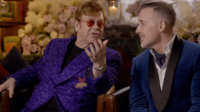 Elton John with his husband David Furnish. Is Elton John Gay, Bi, or Queer?
