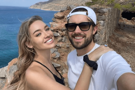 Jack Whitehall with his girlfriend Roxy Horner. His dating life proves that he isn't gay. 