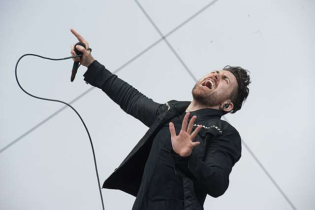 Davey Havok's heavy makeup makes him look like gay. 